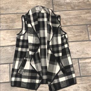 Women’s plaid ruffle front vest